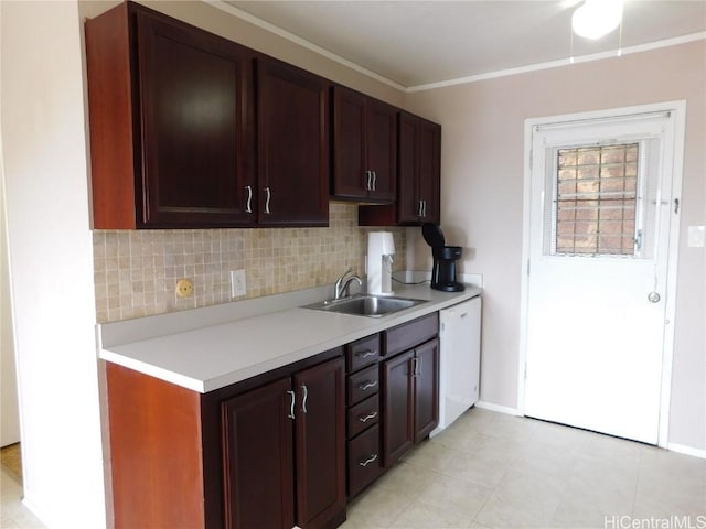 kitchen with crown molding, backsplash, sink, and white dishwasher