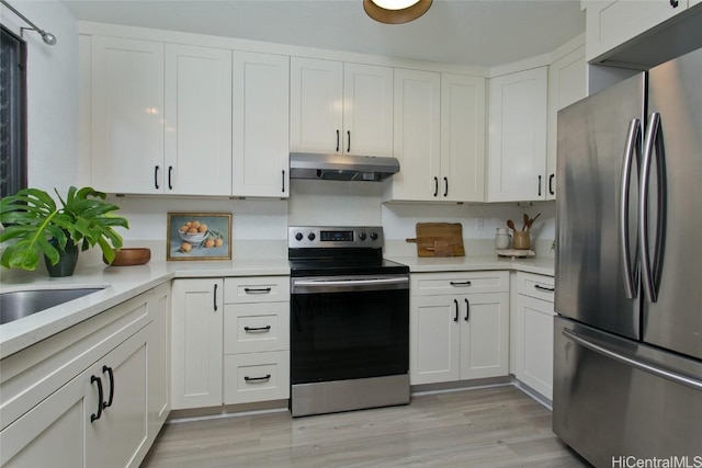 kitchen featuring white cabinets and stainless steel appliances