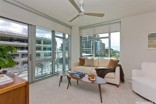 sunroom / solarium with ceiling fan