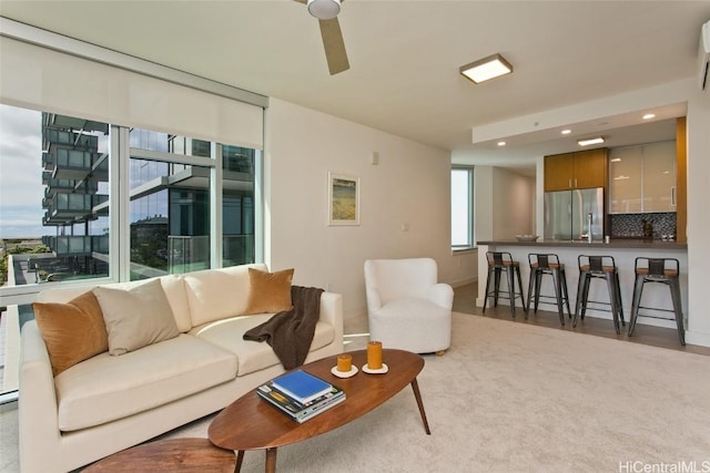 living room featuring ceiling fan