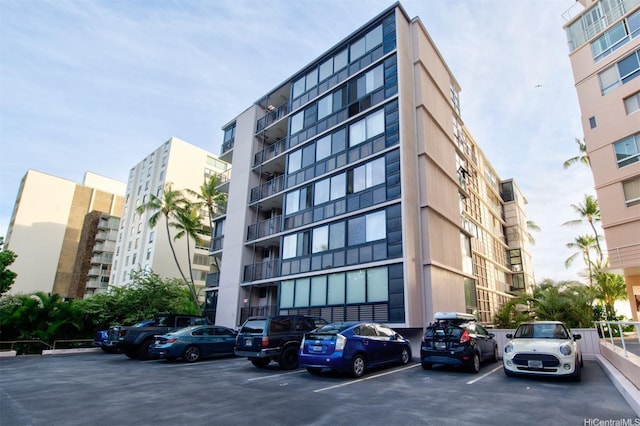 2987 Kalakaua Ave Unit 706, Honolulu, HI 96815 - view of apartment building / complex featuring uncovered parking