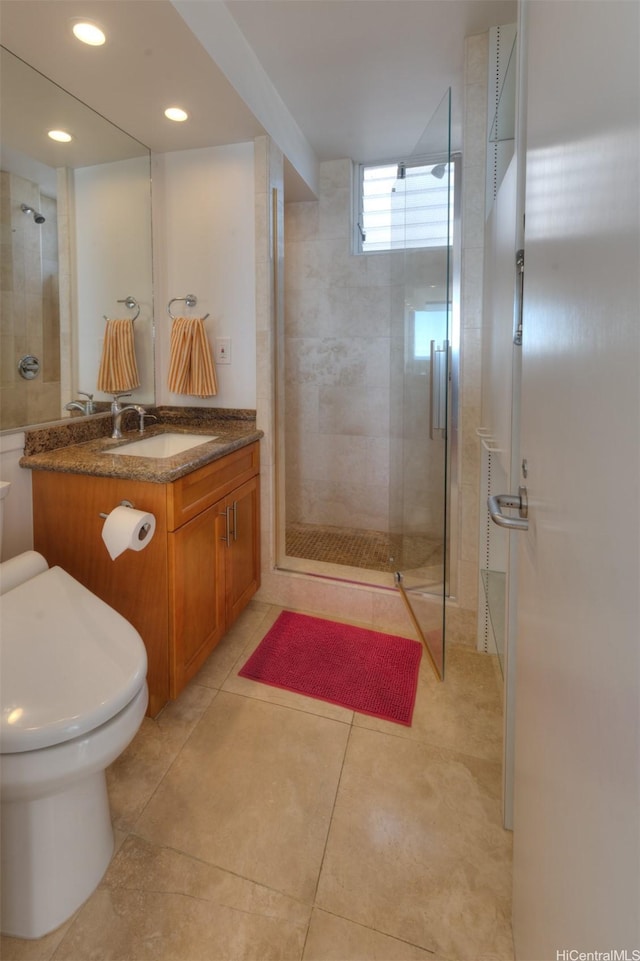 2987 Kalakaua Ave Unit 706, Honolulu, HI 96815 - bathroom with a shower stall, vanity, tile patterned flooring, and recessed lighting