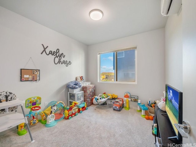 recreation room featuring an AC wall unit and carpet floors