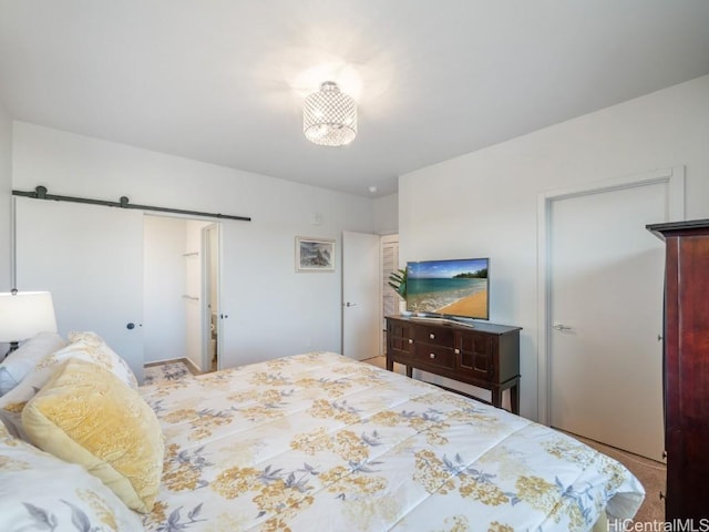 bedroom with a barn door