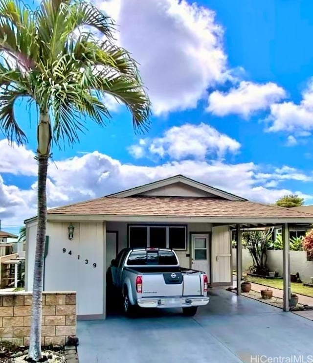 view of front of house with a carport