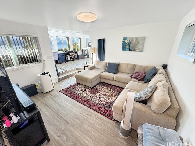 living room with light hardwood / wood-style floors