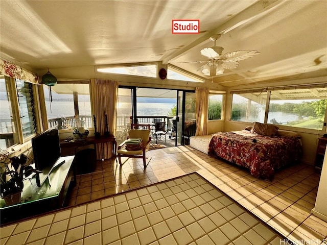 bedroom with a water view, tile patterned floors, access to exterior, and lofted ceiling with beams