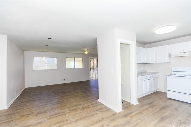 kitchen featuring ceiling fan, white range, white cabinetry, and light hardwood / wood-style flooring