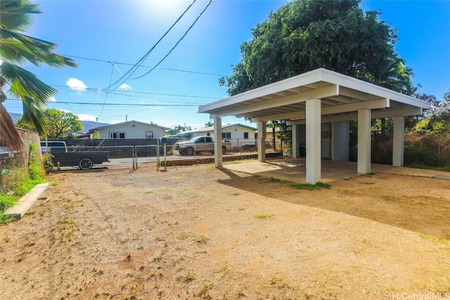 view of yard featuring a carport