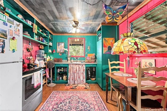 interior space with ceiling fan, wood ceiling, and wood-type flooring