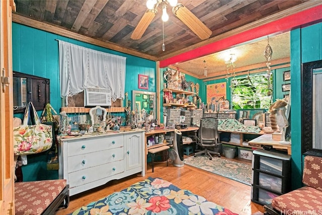 interior space featuring ceiling fan, light hardwood / wood-style flooring, cooling unit, and wooden ceiling