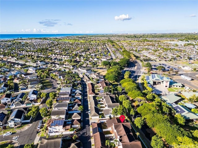 drone / aerial view featuring a water view and a residential view