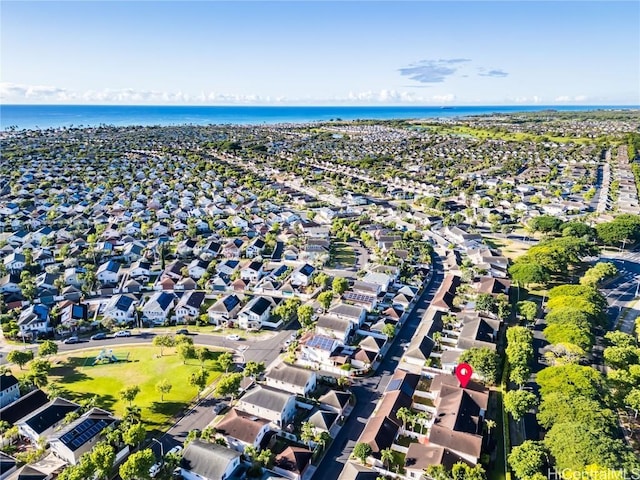 bird's eye view featuring a water view and a residential view