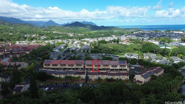 drone / aerial view featuring a mountain view