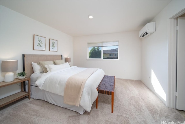 carpeted bedroom featuring a wall mounted air conditioner