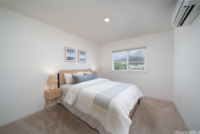 bedroom featuring a wall mounted air conditioner and carpet