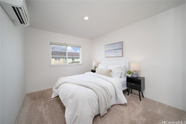 bedroom featuring carpet flooring and a wall mounted AC