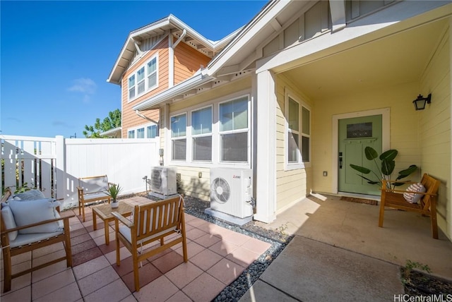 view of patio featuring ac unit and an outdoor hangout area