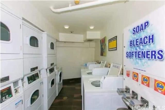 washroom with washer and dryer and stacked washer and clothes dryer