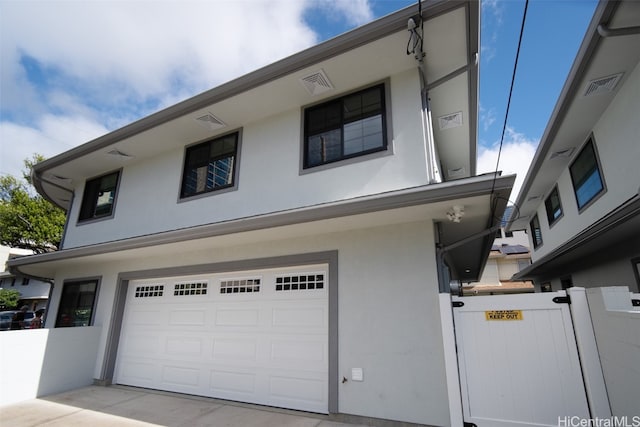 view of front of home with a garage