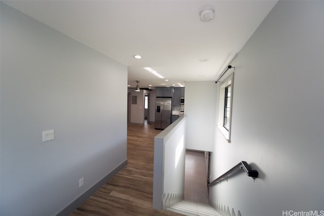 hall with dark hardwood / wood-style floors