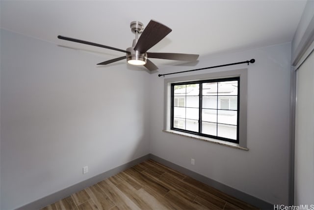 unfurnished room featuring wood-type flooring and ceiling fan