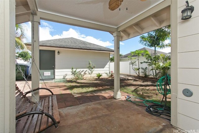 view of patio featuring ceiling fan