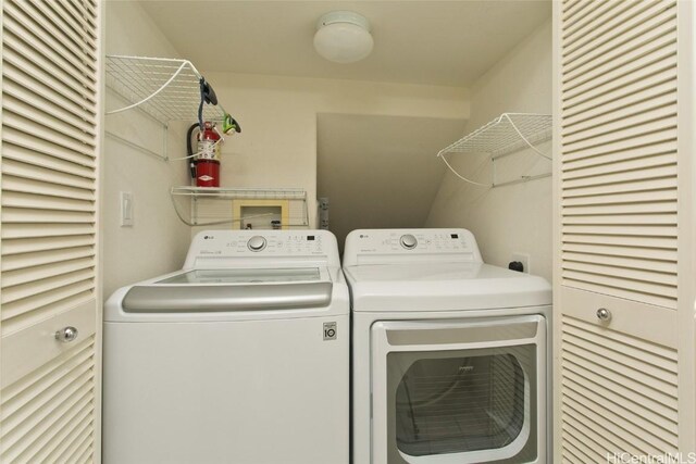 laundry area with washer and clothes dryer