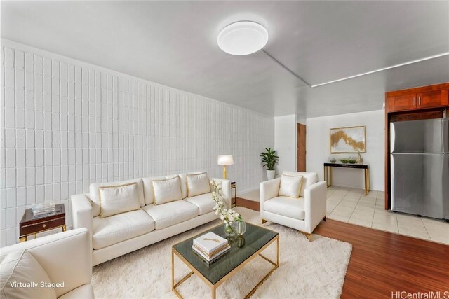 living room with tile patterned flooring