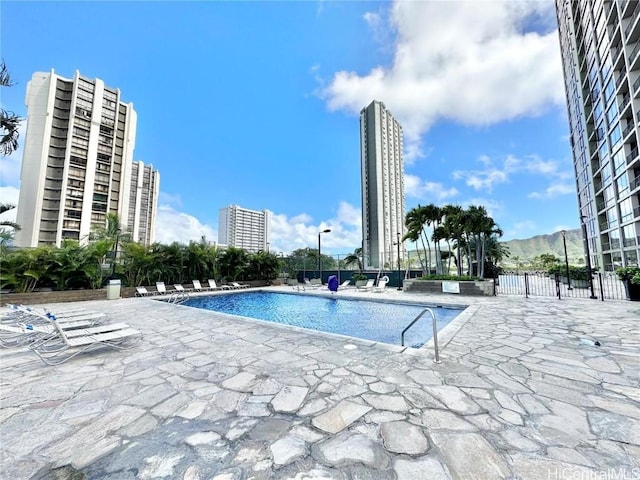 view of pool featuring a patio