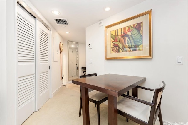 view of carpeted dining area