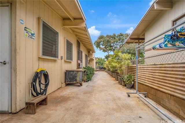 view of side of property with cooling unit