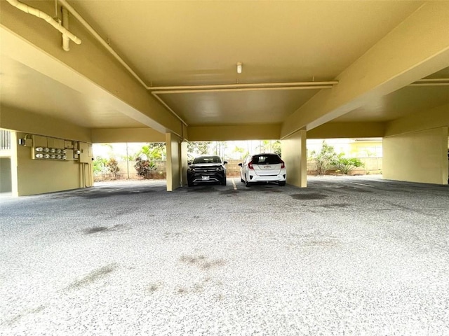 garage featuring a carport