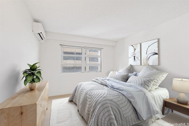 carpeted bedroom featuring a wall mounted AC