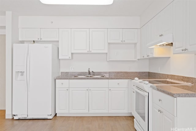 kitchen with custom range hood, white appliances, sink, light hardwood / wood-style flooring, and white cabinetry