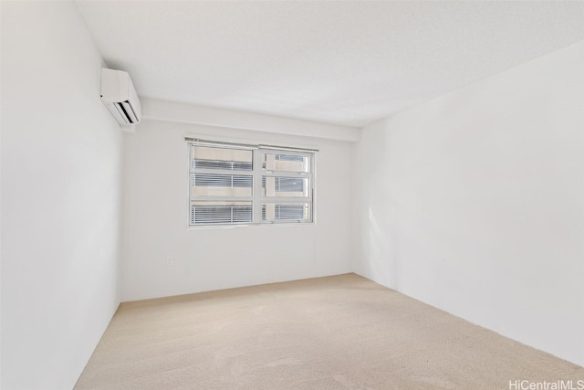 unfurnished room with a wall mounted air conditioner and carpet flooring