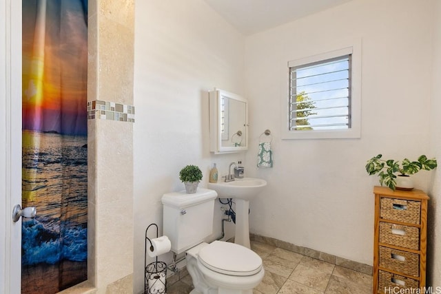 bathroom with sink and toilet