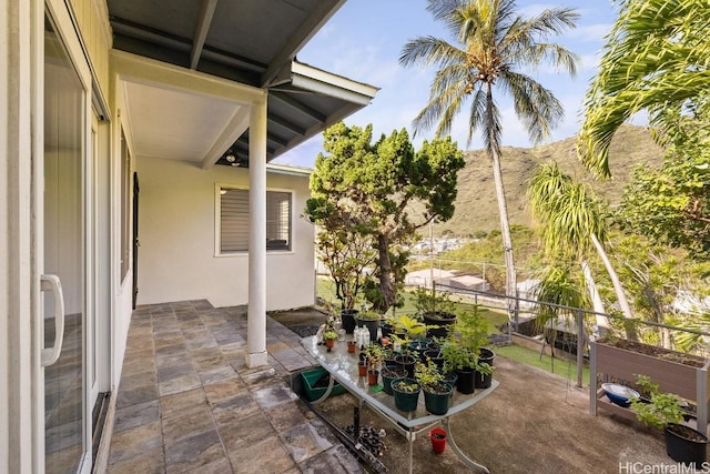 view of patio featuring a mountain view