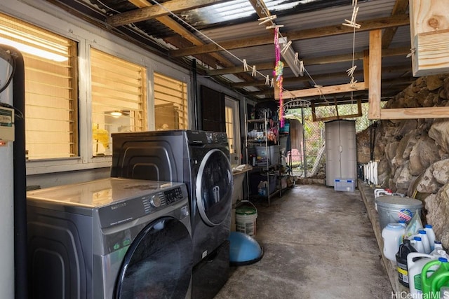 washroom featuring washing machine and dryer