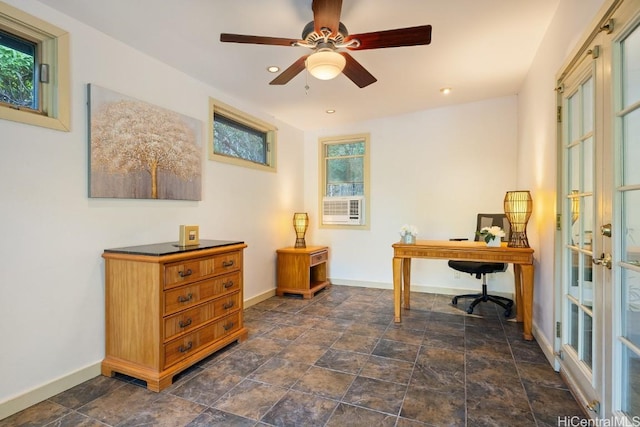 office space featuring plenty of natural light, ceiling fan, and french doors