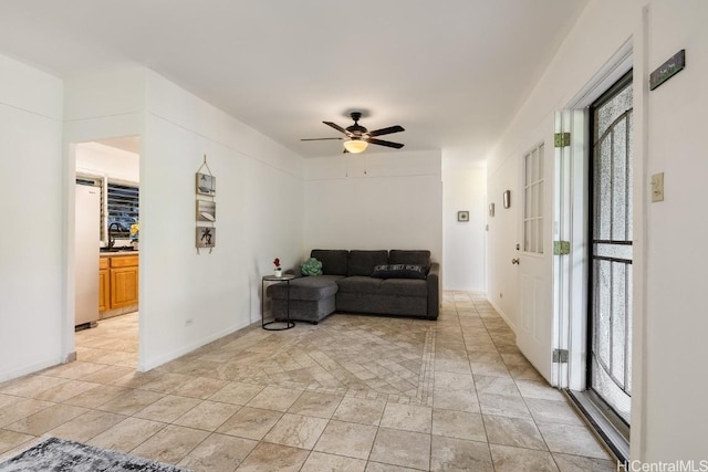 living room featuring ceiling fan