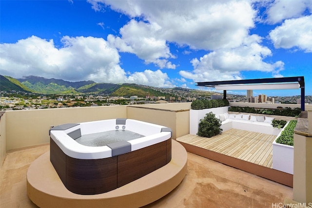 view of patio / terrace with a mountain view