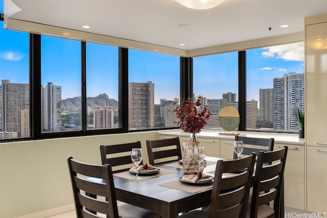 dining room featuring a city view