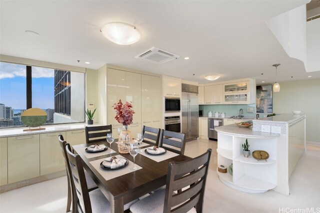 dining space featuring sink