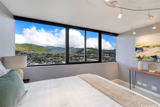 bedroom with a mountain view