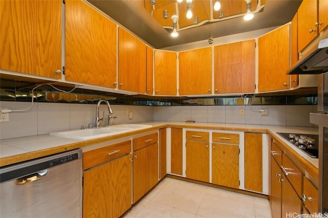 kitchen with dishwasher, light tile patterned flooring, decorative backsplash, and black stovetop