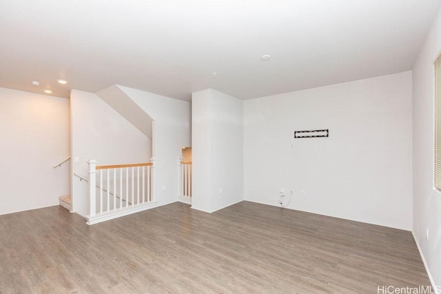 empty room featuring hardwood / wood-style floors