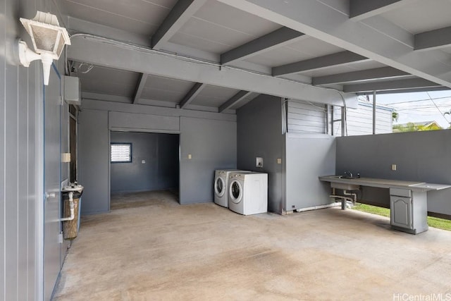 garage with independent washer and dryer