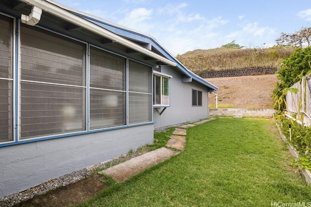 view of home's exterior featuring a lawn