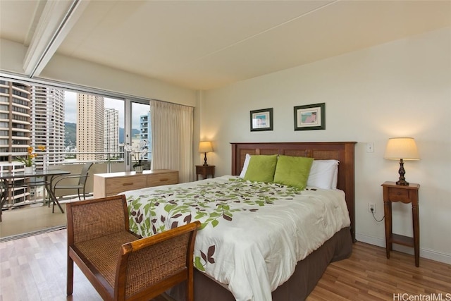 bedroom featuring light wood-type flooring